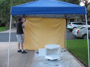 After my first pass at priming in the garage and covering everything with white dust, the Hubsters set up this portage shop for me in our driveway. 