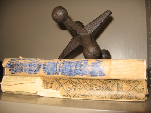 I love these books! One is a vintage Nancy Drew mystery (I think I read every single one of them when I was younger) and the other is the Bobsy twins - each of these cost me $1. I personally love the weathered look. 